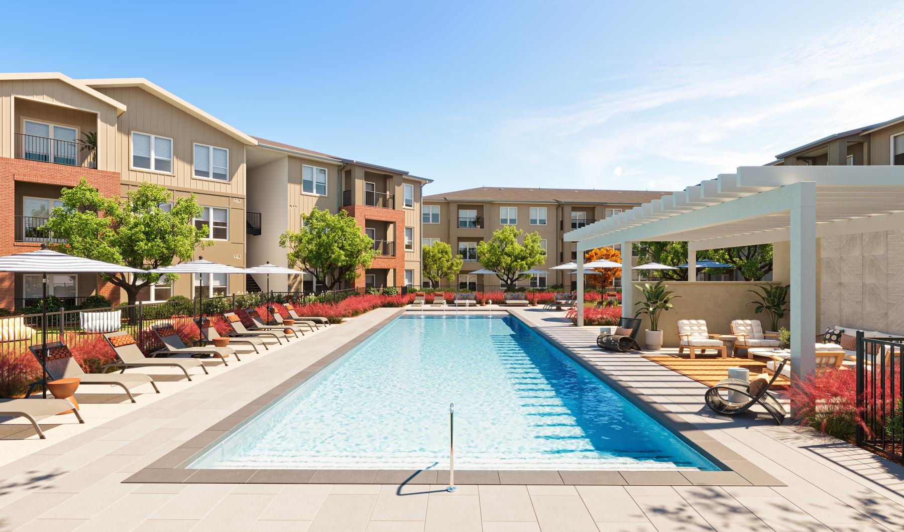 a swimming pool with seating areas